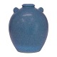 Blåglaseret delvist spættet vase fra Michael Andersen. Stemplet med med Rønnes byvåben. H: 17cm